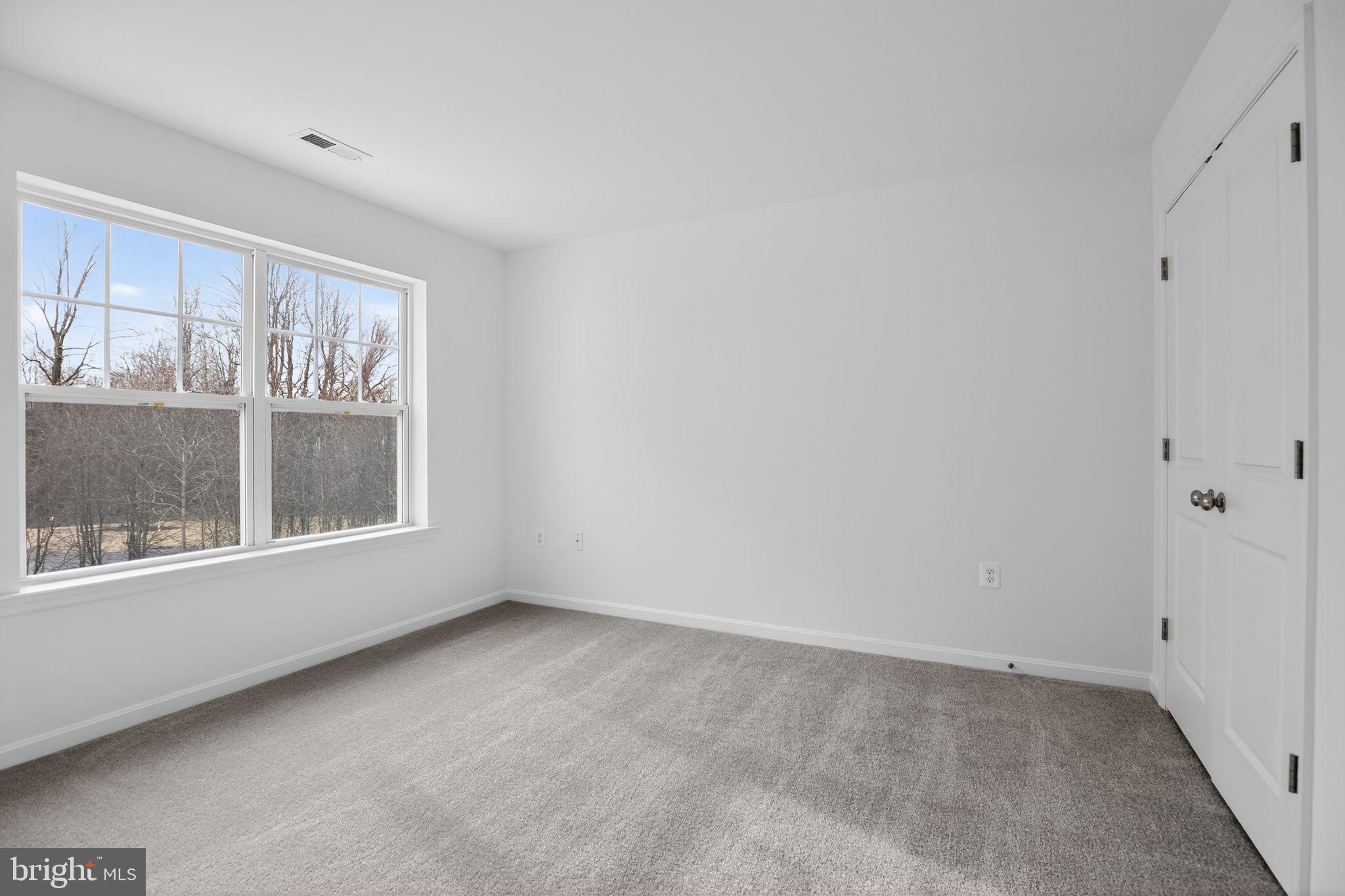 4747 Bryantown Road Waldorf, MD 20601 - Photo 16 of 62 a view of an empty room with a window