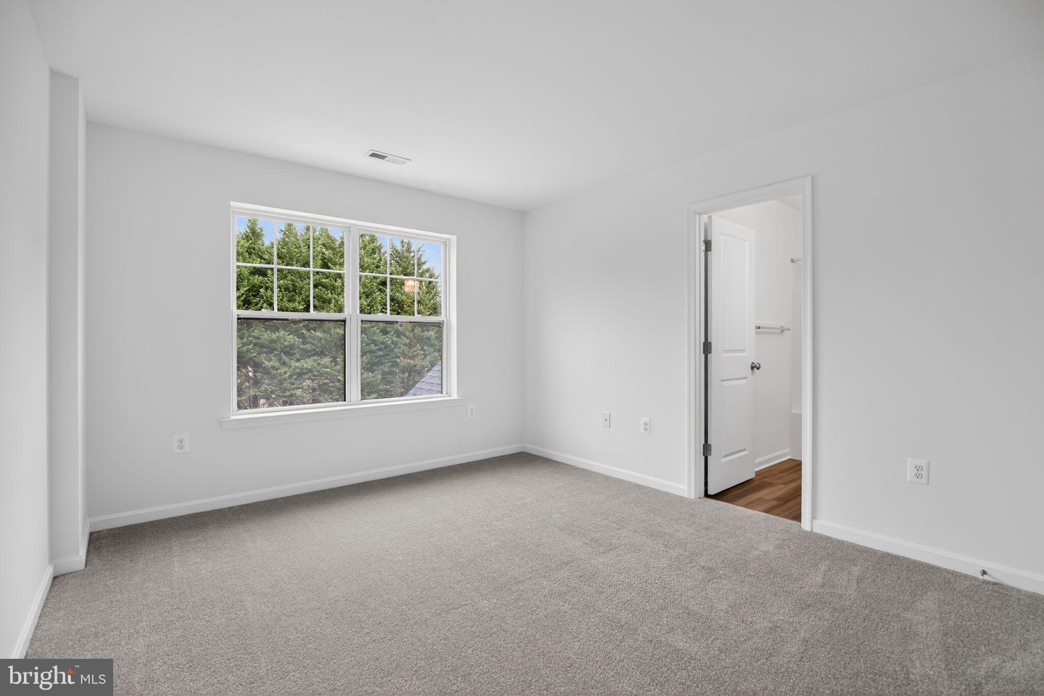 4747 Bryantown Road Waldorf, MD 20601 - Photo 4 of 62 an empty room with windows and closet