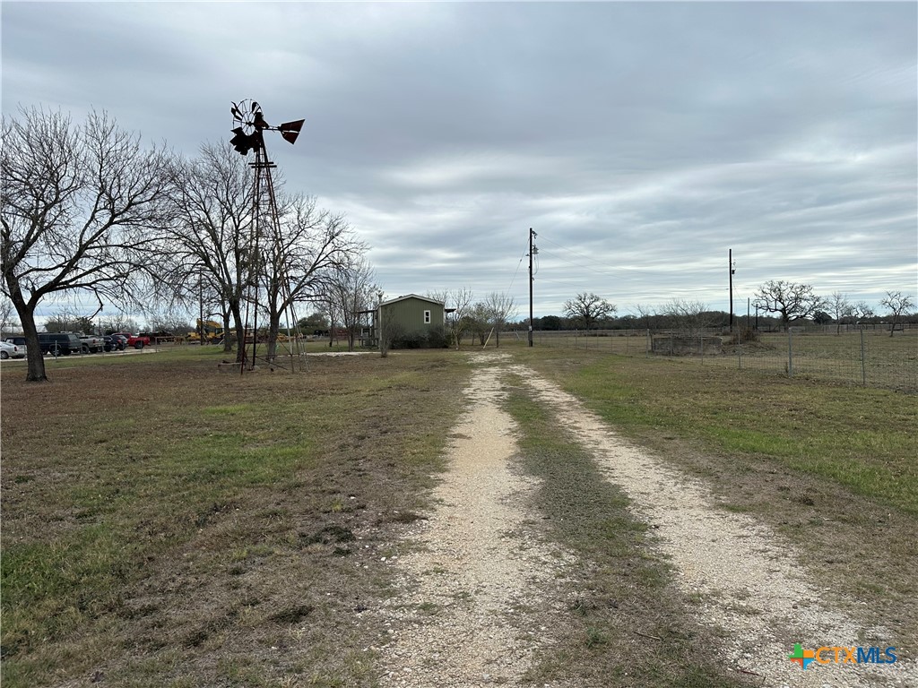 a view of a lake with a big yard