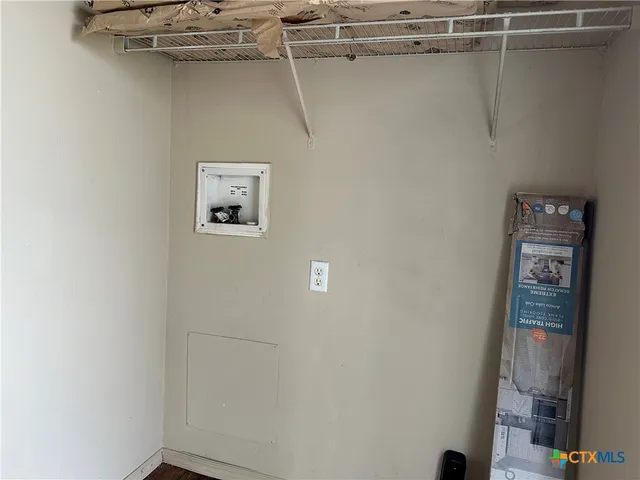 a view of small space with racks on the wall