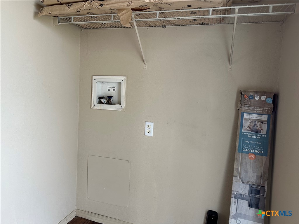 532 Post Office Street Kingsbury, TX 78638 - Photo 13 of 18 a view of small space with racks on the wall