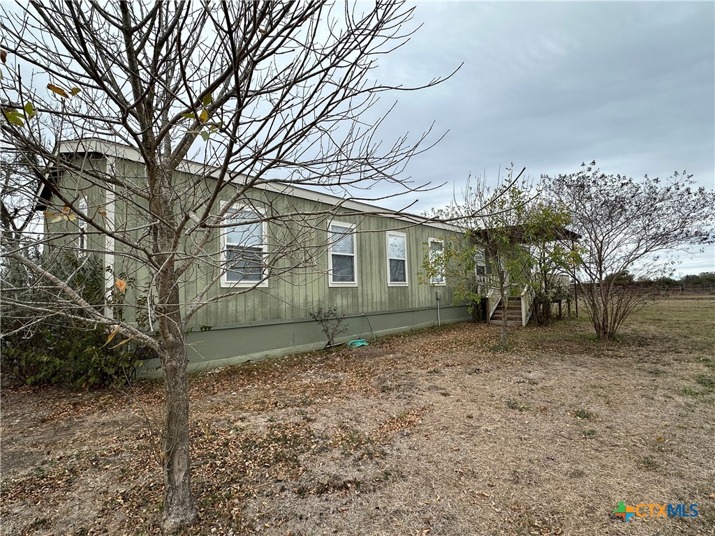 532 Post Office Street Kingsbury, TX 78638 - Photo 5 of 18 a view of a house with a yard