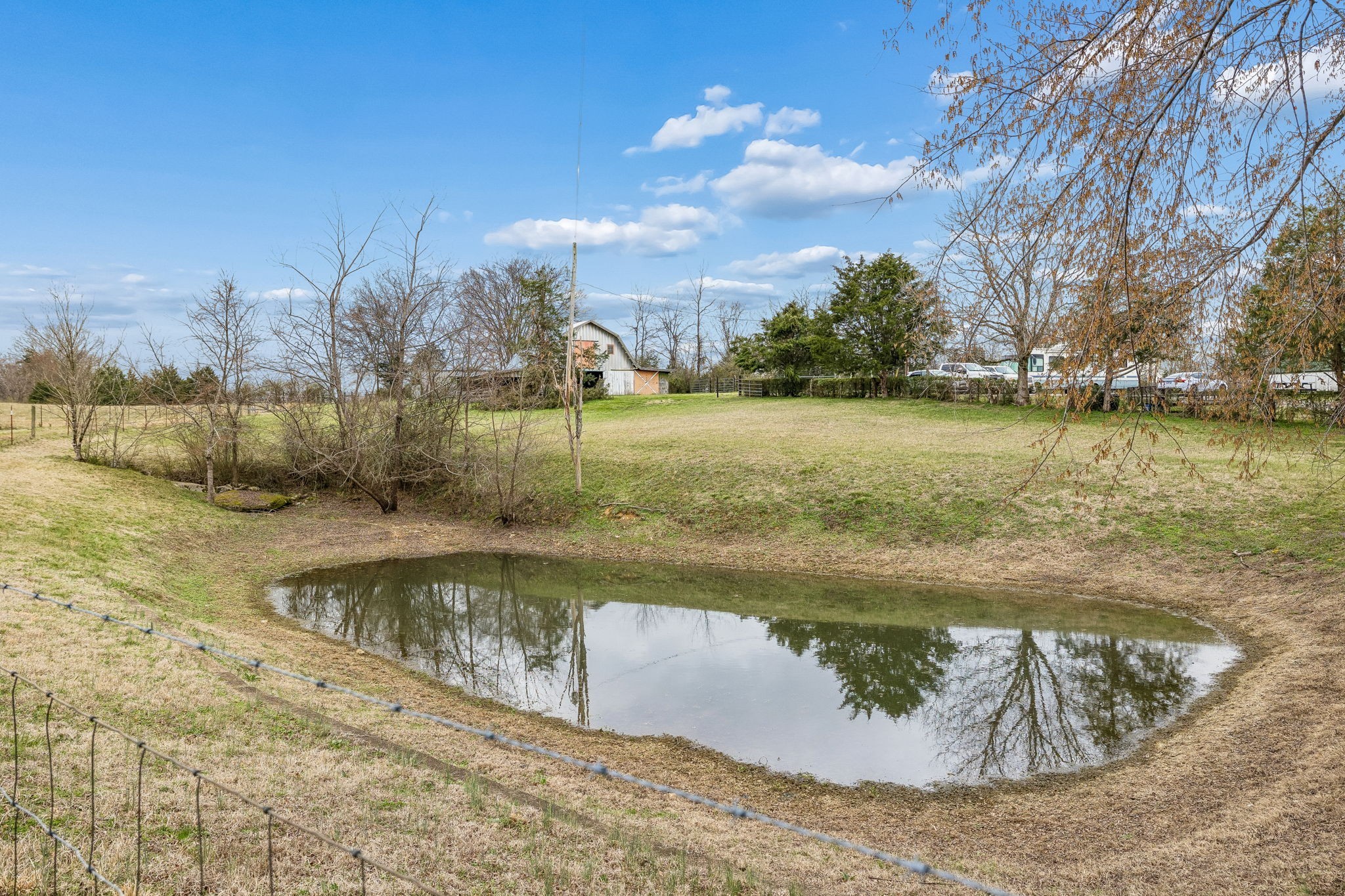 6200 Pinewood Road Nunnelly, TN 37137 - Photo 15 of 57 a view of a lake with houses