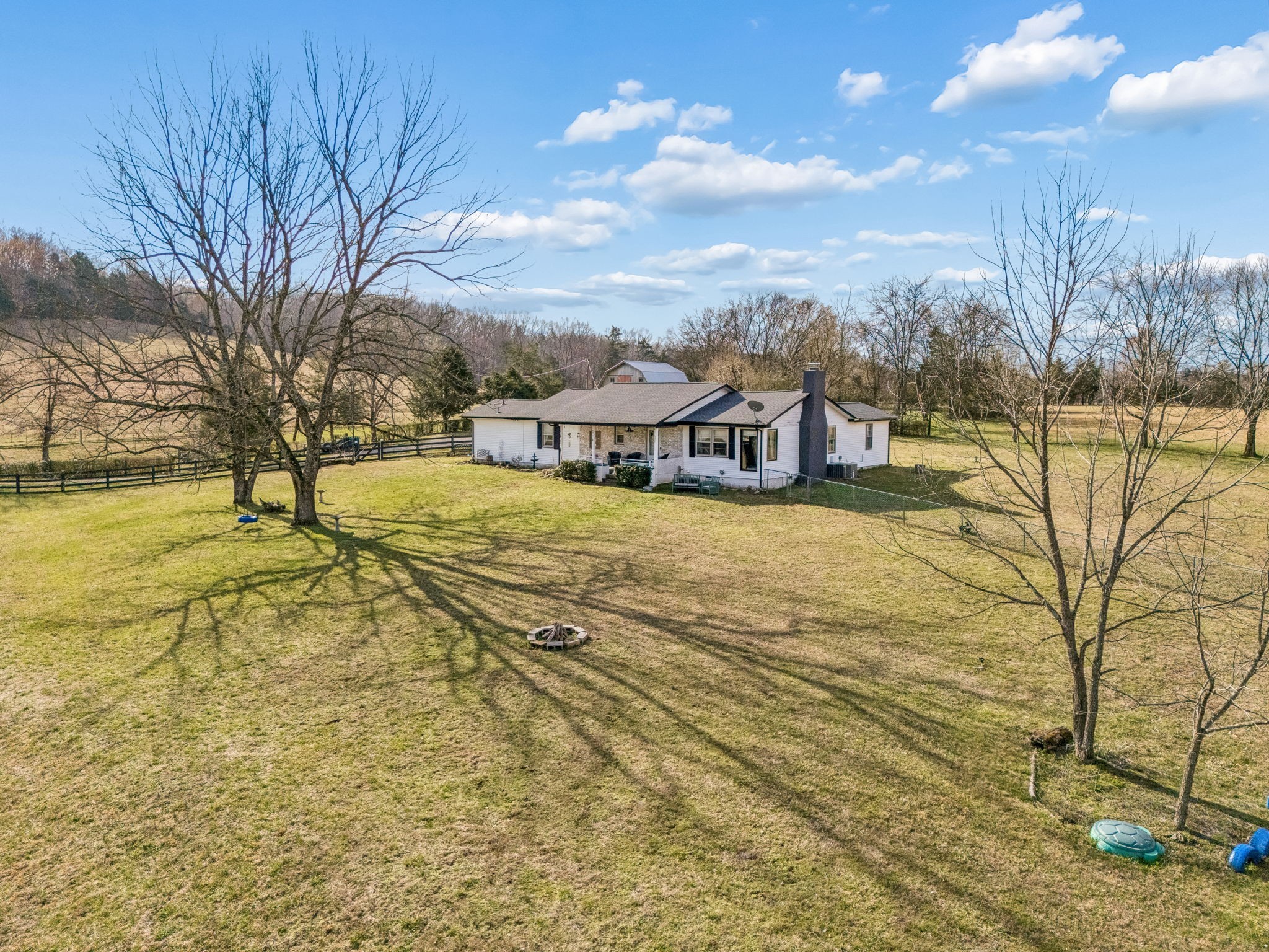 6200 Pinewood Road Nunnelly, TN 37137 - Photo 39 of 57 a view of a lake with houses