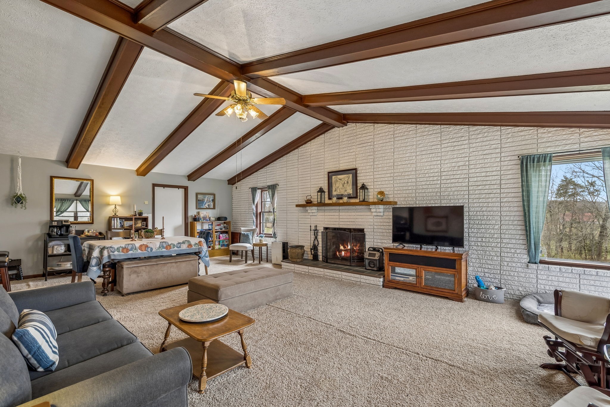 6200 Pinewood Road Nunnelly, TN 37137 - Photo 46 of 57 a living room with furniture and a fireplace