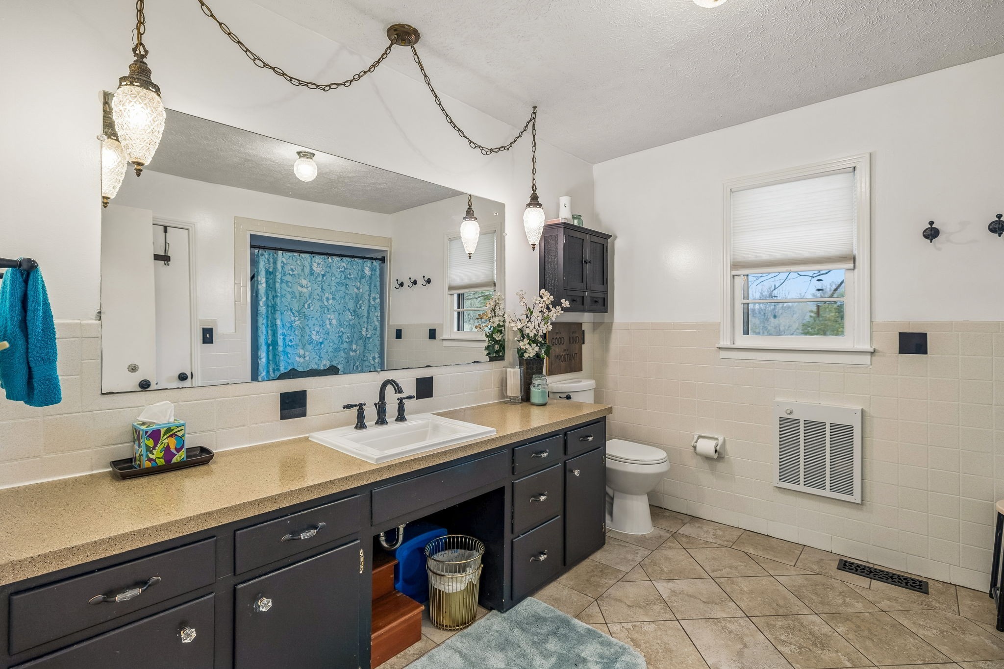 6200 Pinewood Road Nunnelly, TN 37137 - Photo 51 of 57 a bathroom with a double vanity sink and a mirror