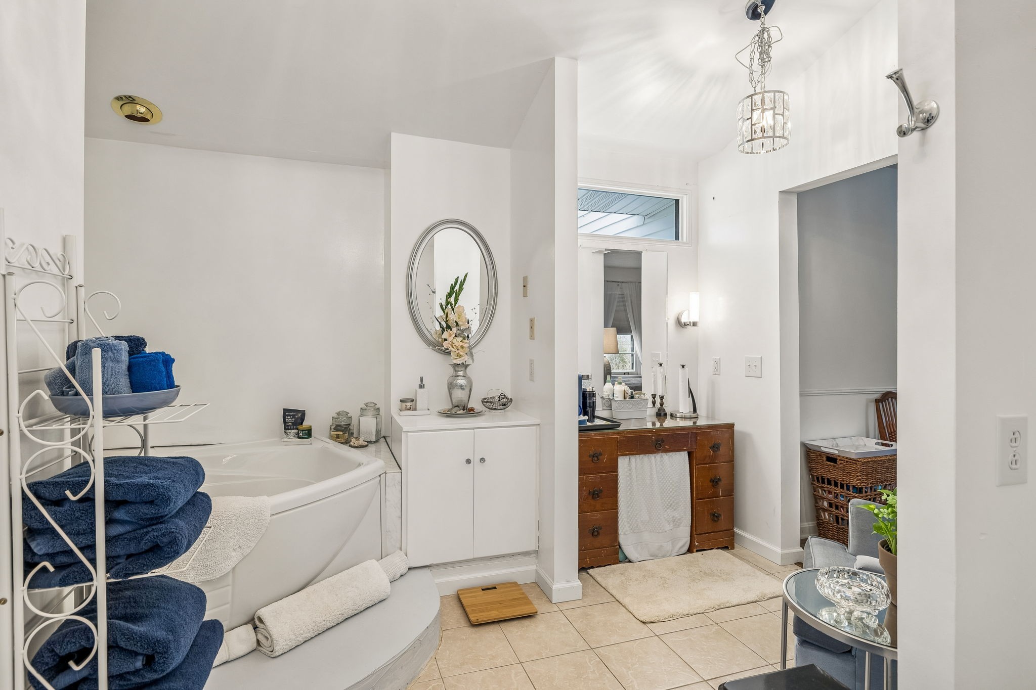 6200 Pinewood Road Nunnelly, TN 37137 - Photo 56 of 57 a living room with a couch and a chandelier