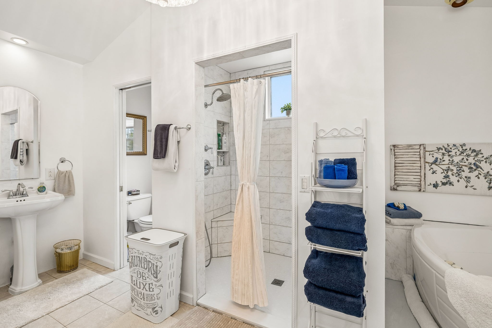 6200 Pinewood Road Nunnelly, TN 37137 - Photo 57 of 57 a bathroom with a shower and a sink