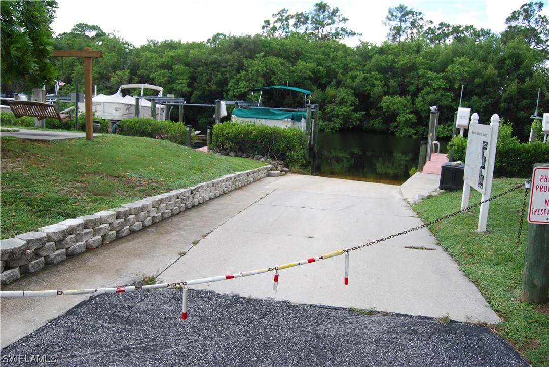 20690 Port Drive Estero, FL 33928 - Photo 2 of 5 a view of a park with large trees
