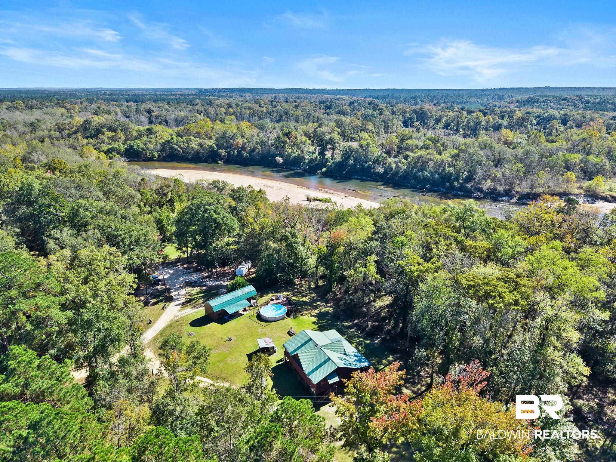 724 Rowell Lane Brewton, AL 36426 - Photo 36 of 40 Aerial view of a heavily wooded area