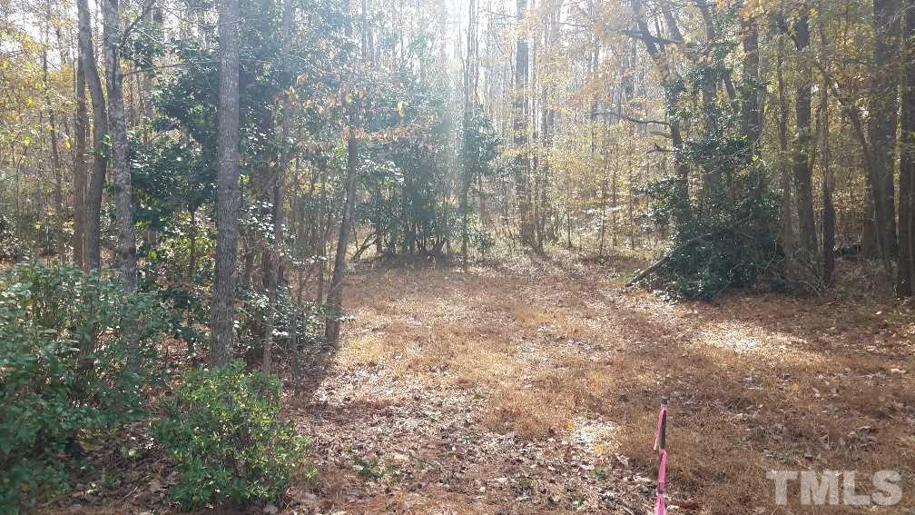 8037 Middleton Road Garner, NC 27529 - Photo 2 of 9 a view of a forest with trees in the background