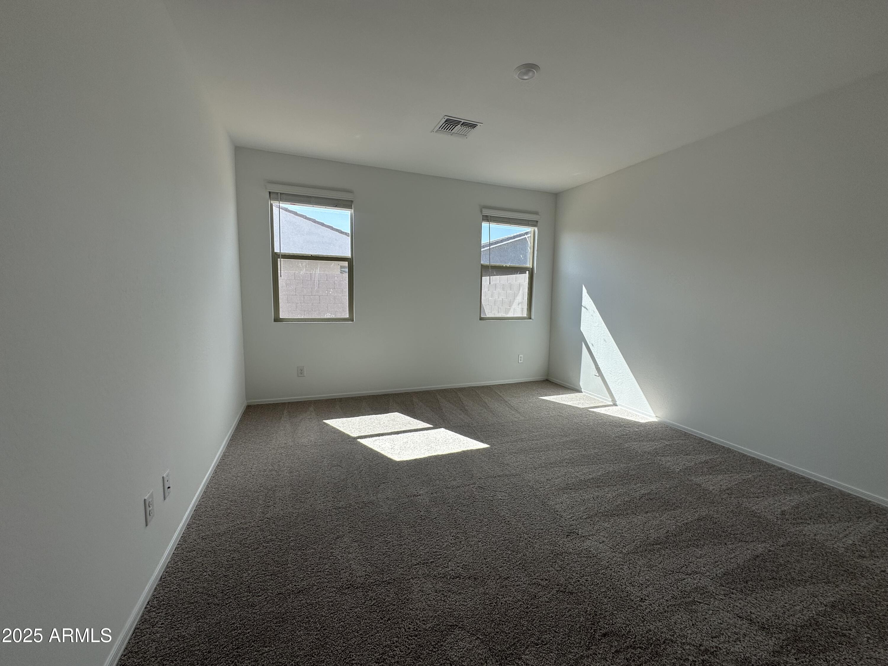 47691 West Moeller Road Maricopa, AZ 85139 - Photo 16 of 31 an empty room with a window
