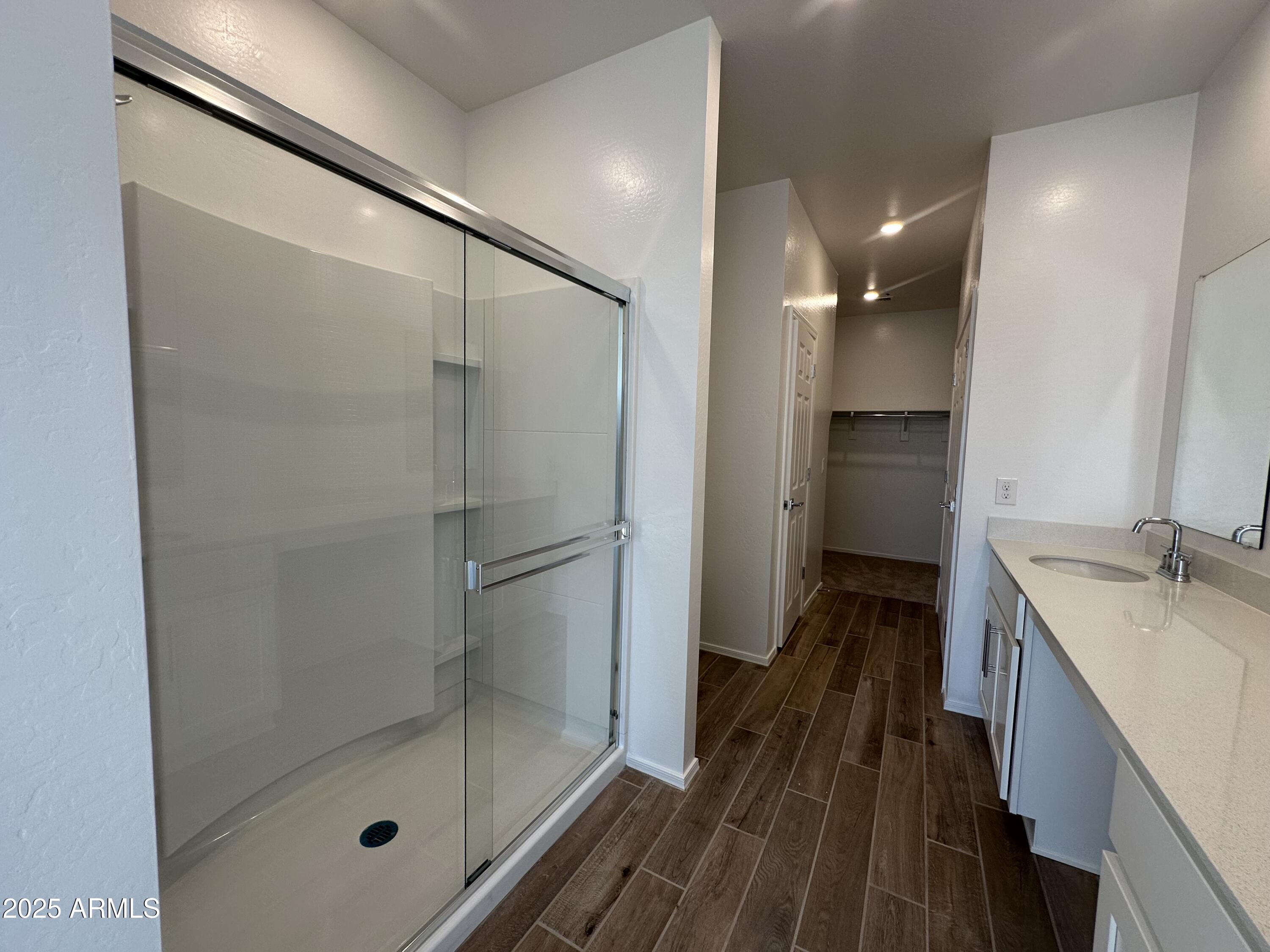47691 West Moeller Road Maricopa, AZ 85139 - Photo 18 of 31 a bathroom with a shower and a sink