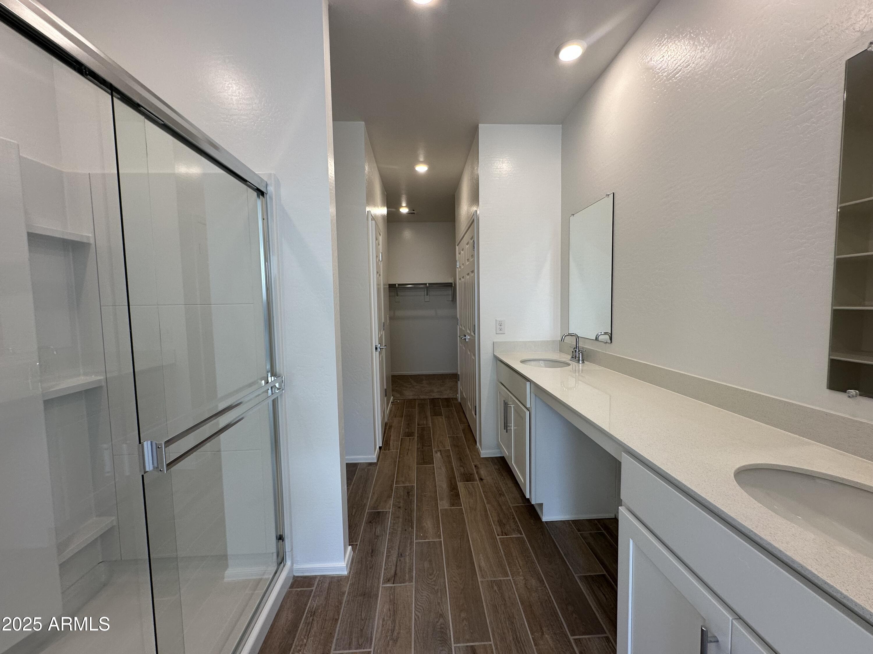 47691 West Moeller Road Maricopa, AZ 85139 - Photo 20 of 31 a bathroom with a sink and a mirror