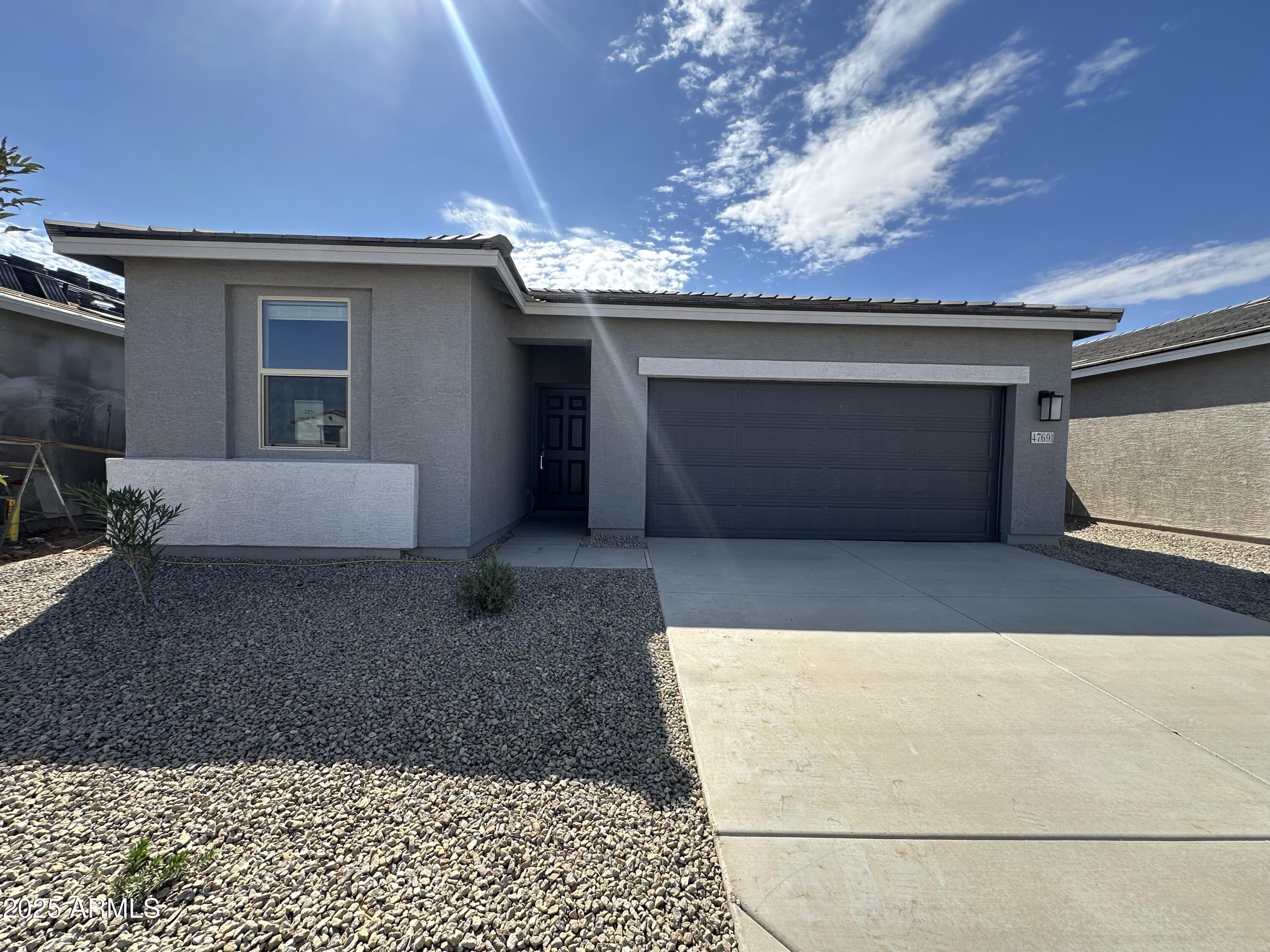 47691 West Moeller Road Maricopa, AZ 85139 - Photo 2 of 31 a view of a garage