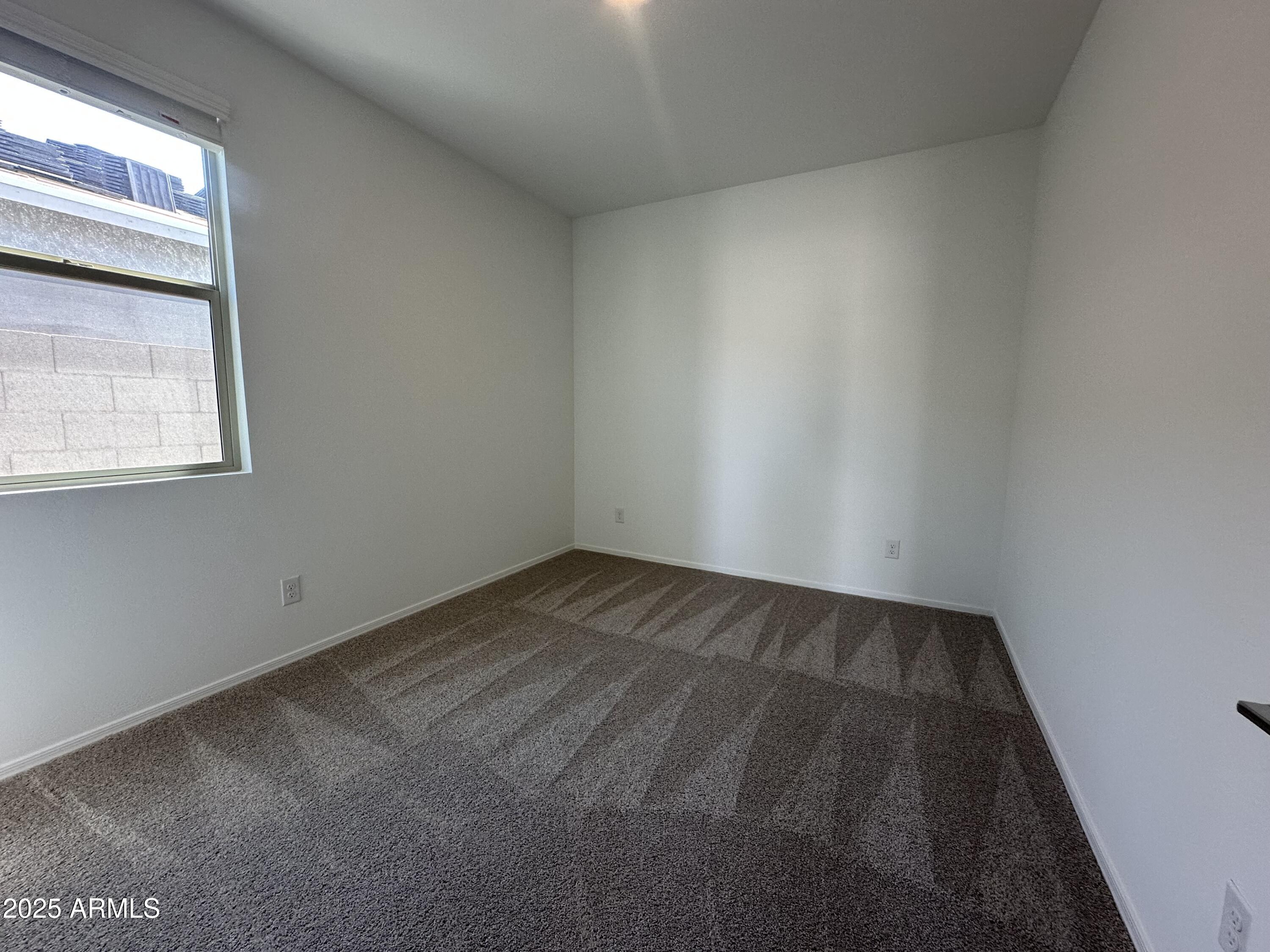 47691 West Moeller Road Maricopa, AZ 85139 - Photo 6 of 31 a view of an empty room and window