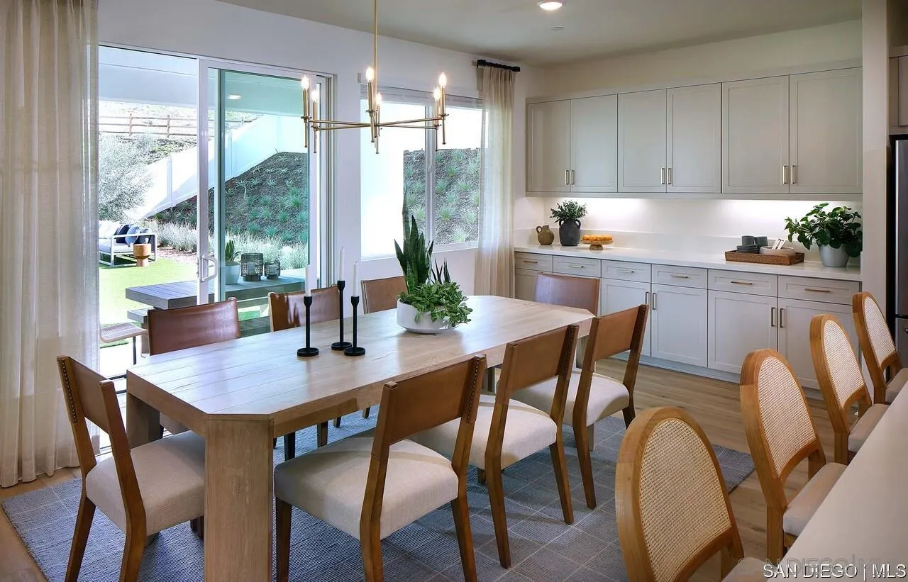 709 Meadowood Street, Unit 328 Fallbrook, CA 92028 - Photo 8 of 11 a view of a dining room with furniture window and outside view