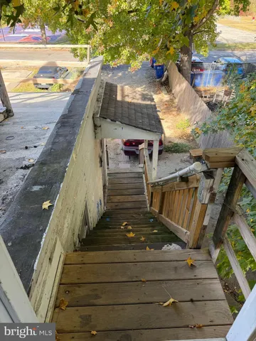 a view of balcony with wooden floor