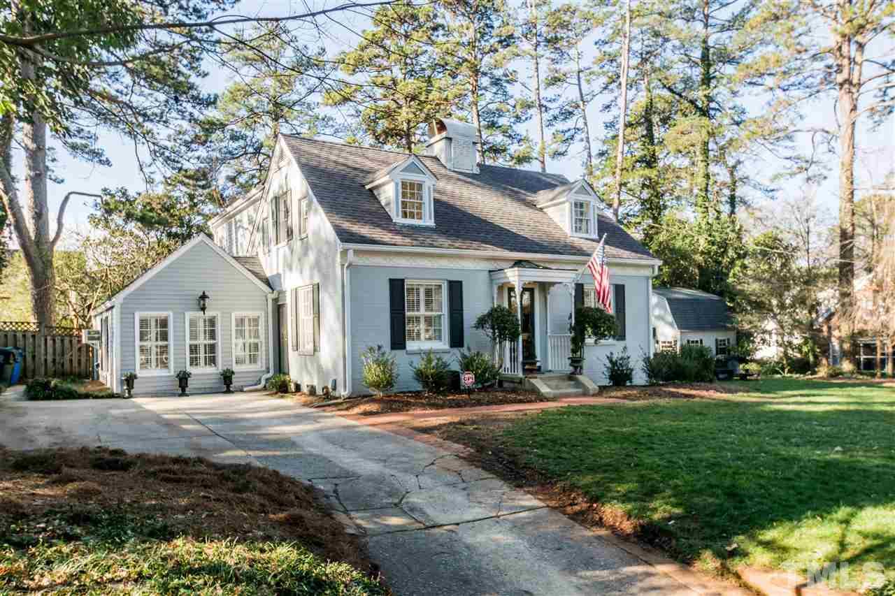 3205 Merriman Avenue Raleigh, NC 27607 - Photo 1 of 30 a front view of a house with a yard