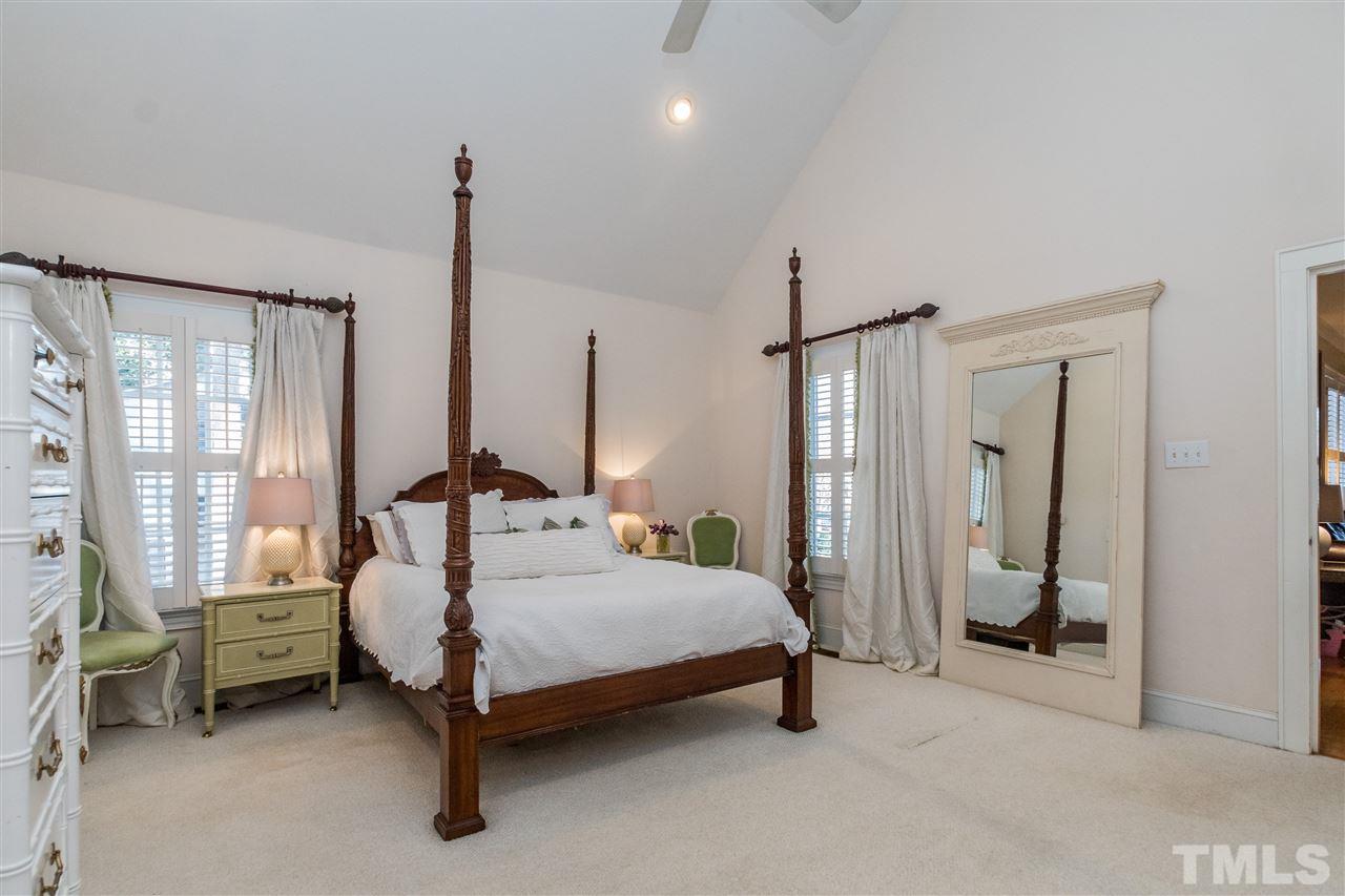 3205 Merriman Avenue Raleigh, NC 27607 - Photo 14 of 30 a bed room with a bed and a window