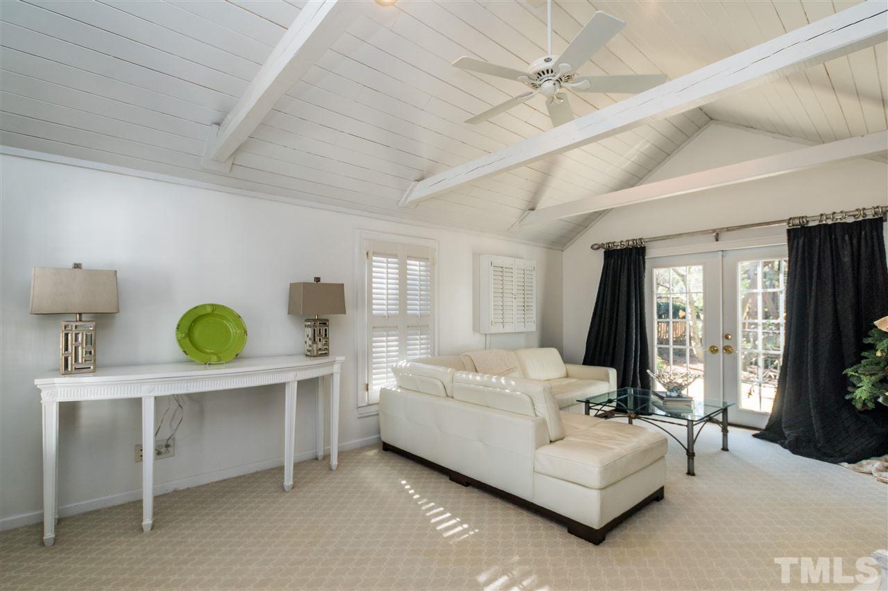 3205 Merriman Avenue Raleigh, NC 27607 - Photo 16 of 30 a living room with furniture and a large window