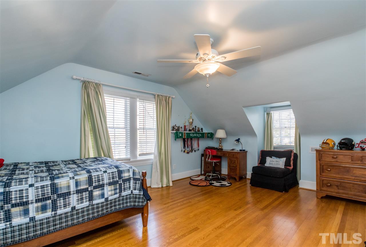 3205 Merriman Avenue Raleigh, NC 27607 - Photo 23 of 30 a bedroom with furniture and a window