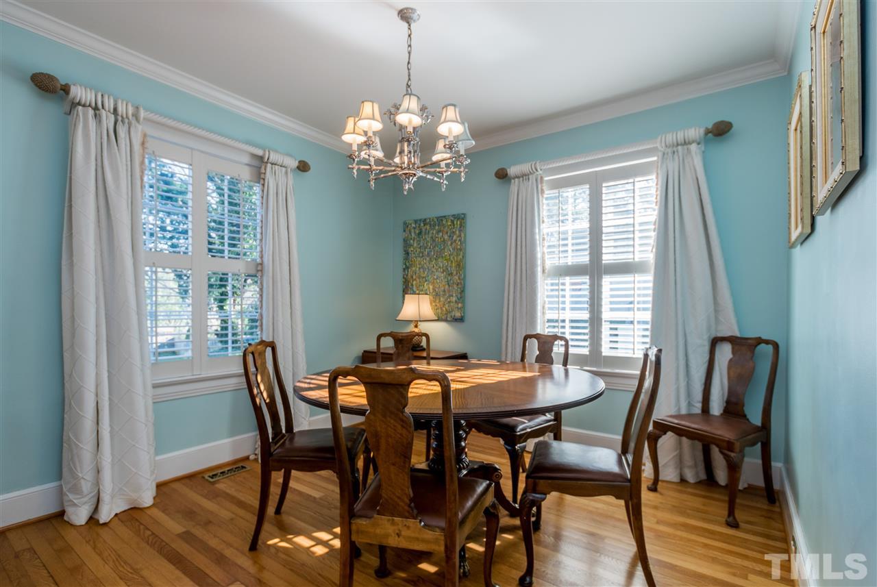 3205 Merriman Avenue Raleigh, NC 27607 - Photo 5 of 30 a view of a dining room with furniture window and wooden floor