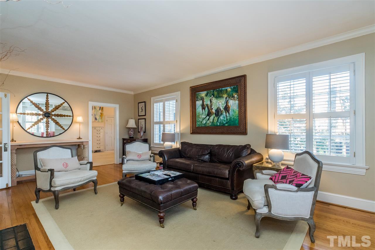 3205 Merriman Avenue Raleigh, NC 27607 - Photo 6 of 30 a living room with furniture and a large window