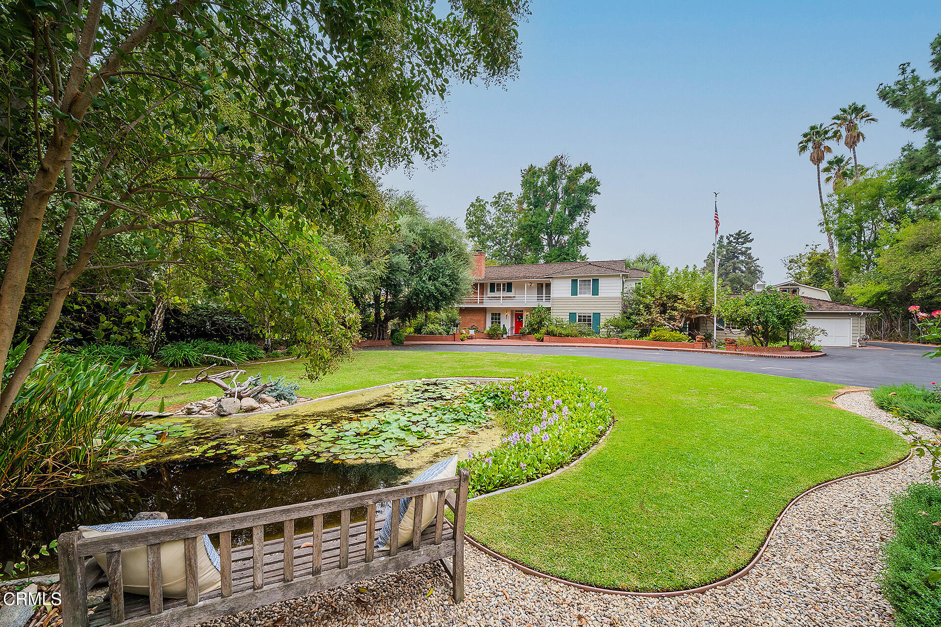 a view of a swimming pool with a garden
