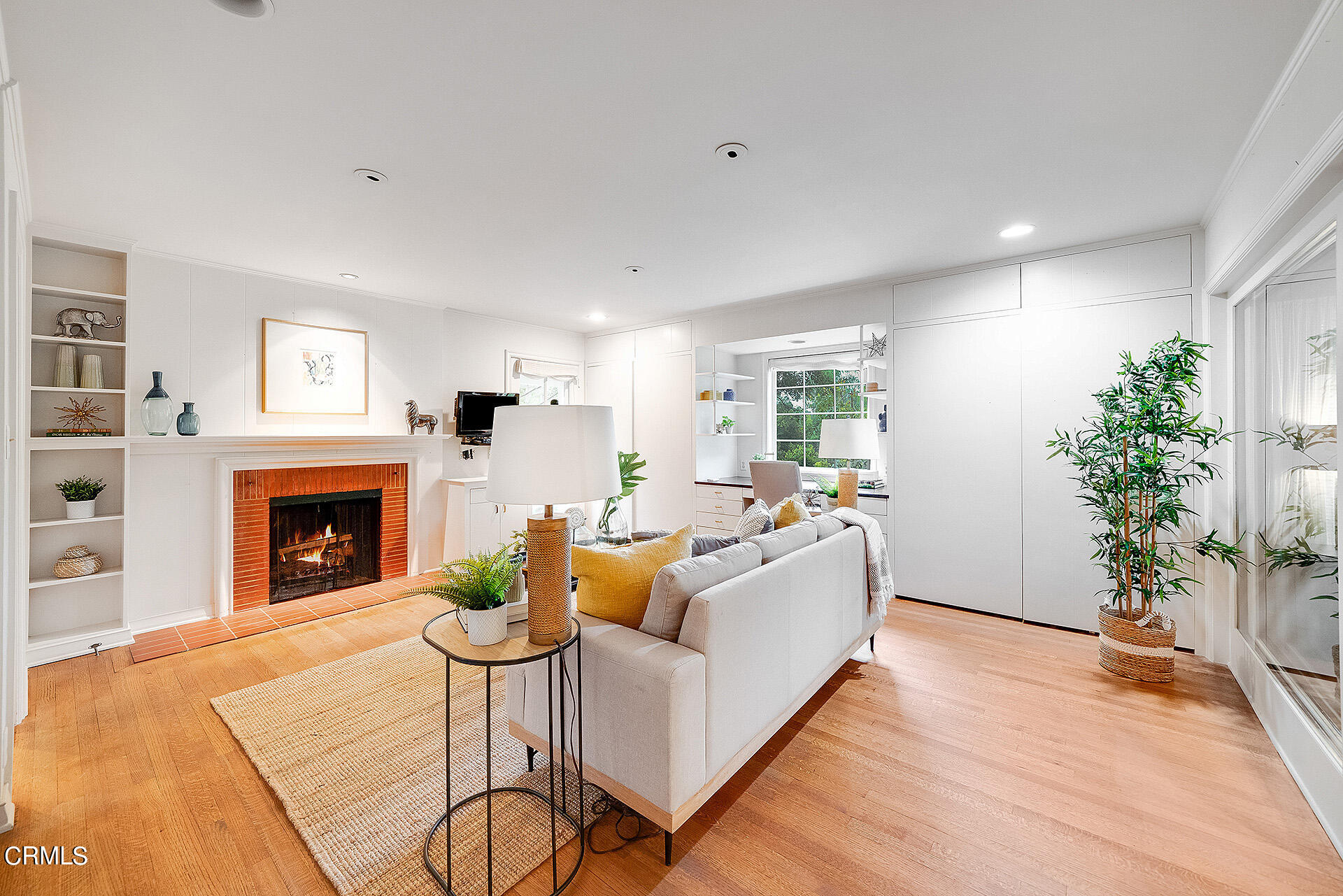 2035 South Oak Knoll Avenue San Marino, CA 91108 - Photo 19 of 29 a living room with furniture and a fireplace