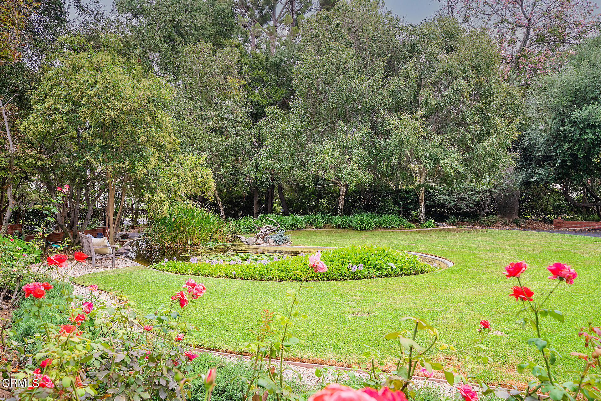 2035 South Oak Knoll Avenue San Marino, CA 91108 - Photo 3 of 29 a view of green field with flowers
