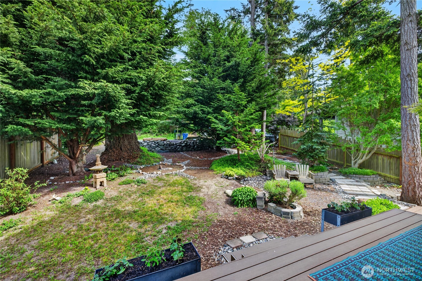 17946 Cobahud Road La Conner, WA 98257 - Photo 16 of 40 a backyard of a house with lots of green space