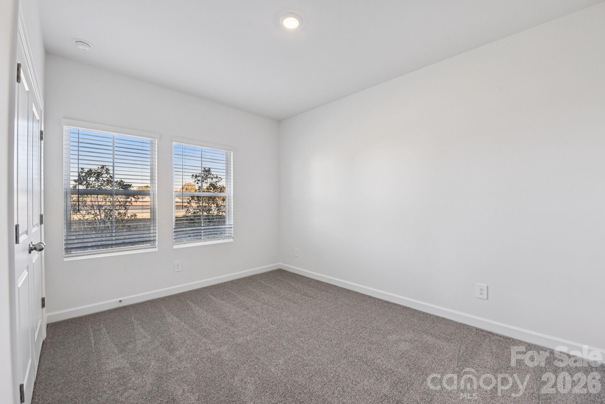 343 Golden Maple Court Fort Mill, SC 29708 - Photo 14 of 19 an empty room with a window