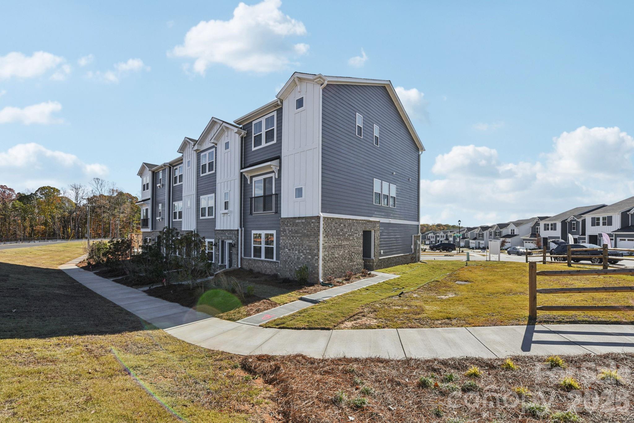 343 Golden Maple Court Fort Mill, SC 29708 - Photo 2 of 19 a view of a swimming pool with a terrace