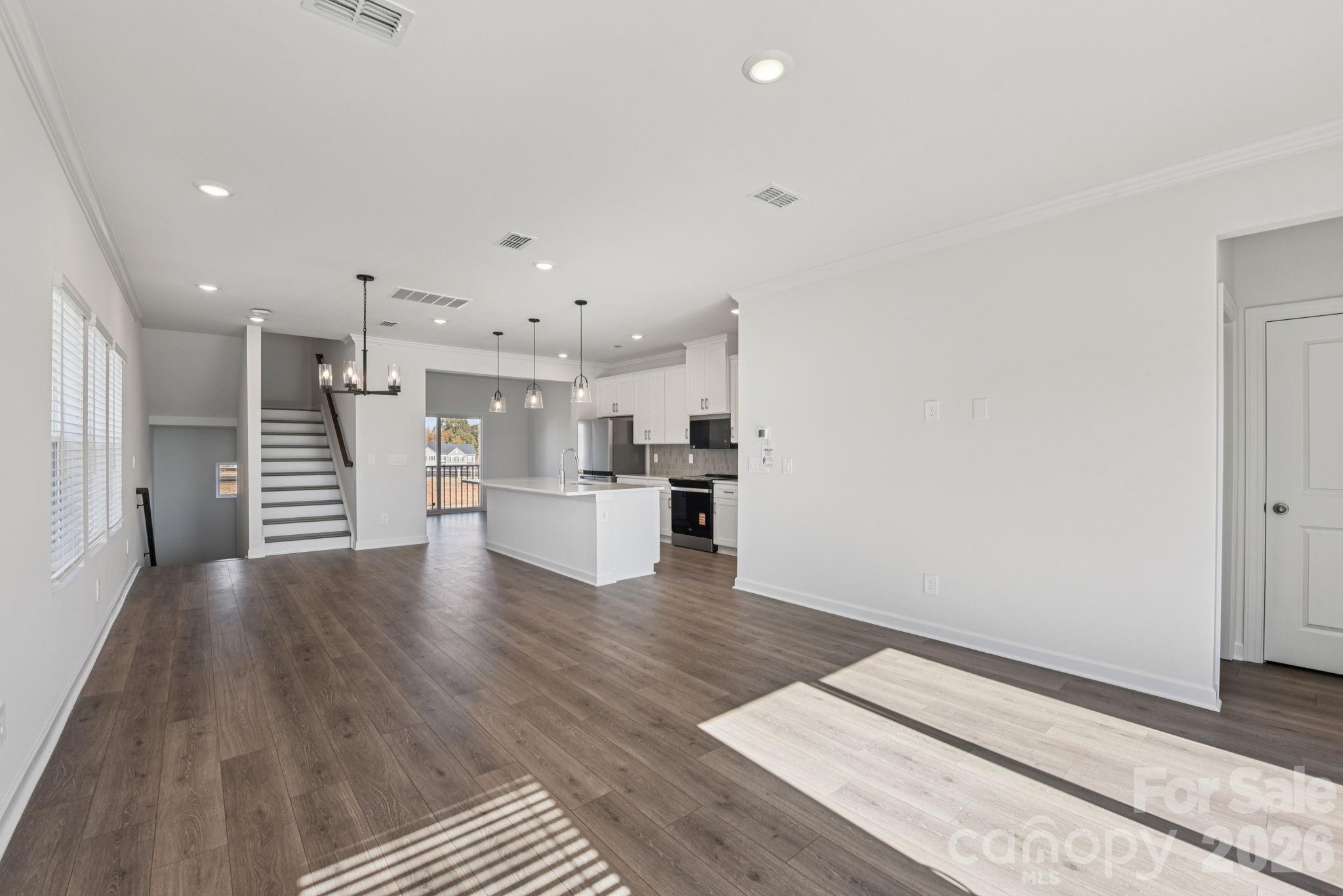343 Golden Maple Court Fort Mill, SC 29708 - Photo 7 of 19 a view of kitchen with wooden floor