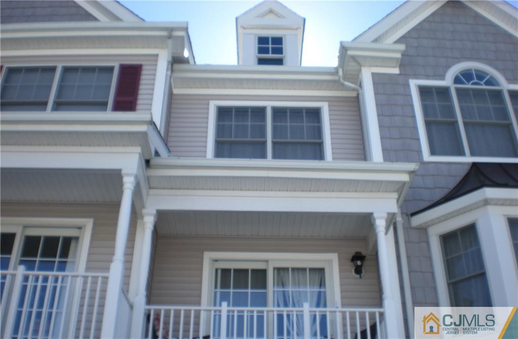 19 Raritan Reach Road South Amboy, NJ 08879 - Photo 4 of 6 a front view of a house with windows