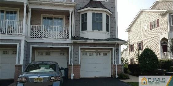 19 Raritan Reach Road South Amboy, NJ 08879 - Photo 6 of 6 a front view of a house with a garden