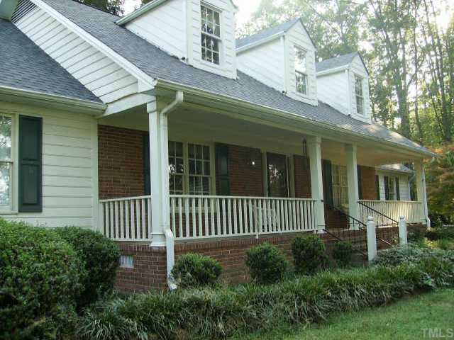 301 Hesters Store Road Roxboro, NC 27574 - Photo 1 of 6 a view of a house with a yard