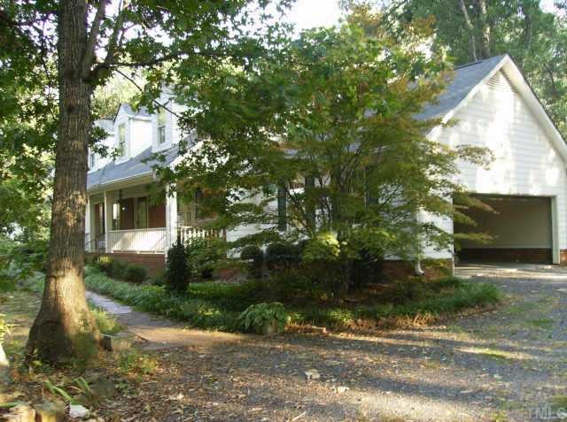 301 Hesters Store Road Roxboro, NC 27574 - Photo 4 of 6 a front view of a house with yard