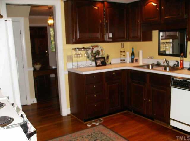 301 Hesters Store Road Roxboro, NC 27574 - Photo 5 of 6 a kitchen with a sink and cabinets