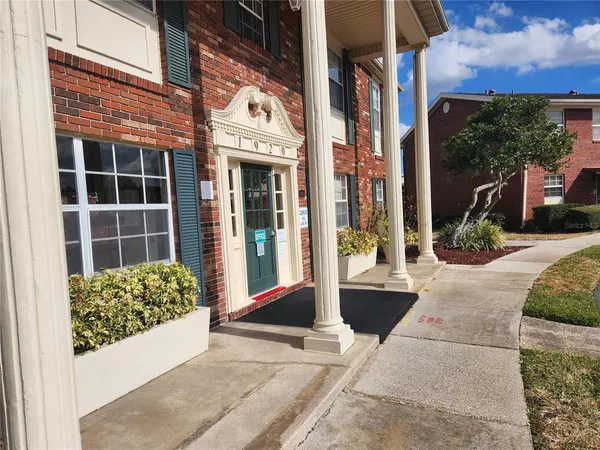 a view of a entryway door front of house