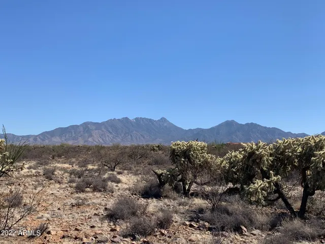 a view of lake with mountain
