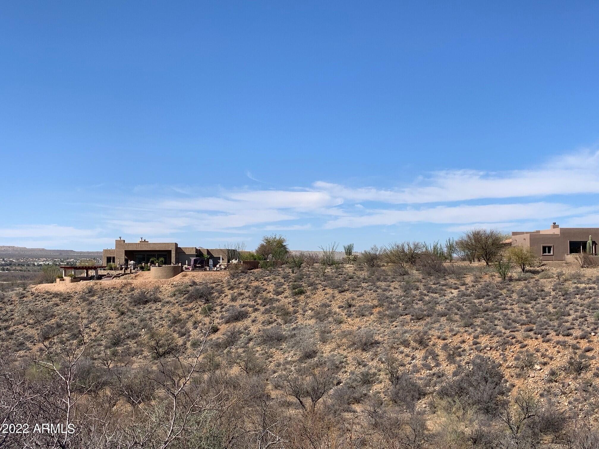 640 East Canyon Rock Road, Unit 49 Green Valley, AZ 85614 - Photo 27 of 34 a view of a beach with ocean view