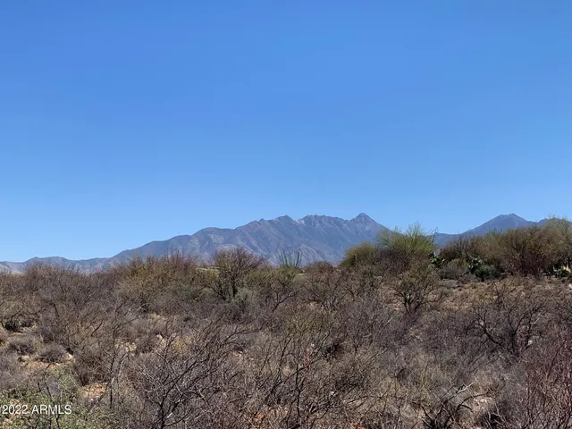 a view of a city with mountain
