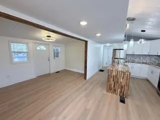 a view of livingroom with furniture and window