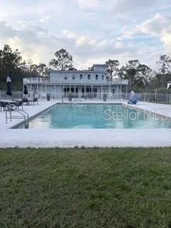 a view of a lake with a building in the background