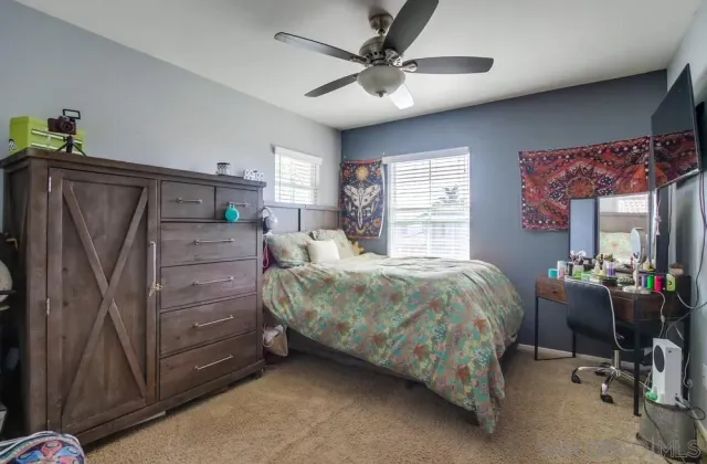 a bed room with a bed and furniture