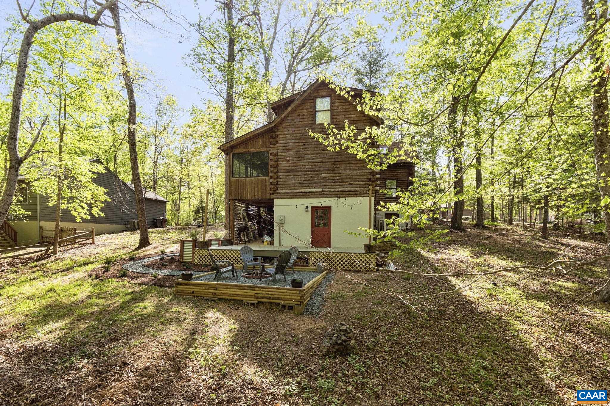 17 Dogleg Road Palmyra, VA 22963 - Photo 54 of 72 a view of a house with backyard and sitting area