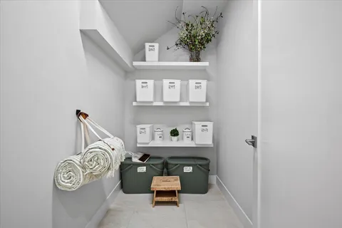 a room with furniture and a window