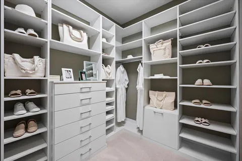 a swimming pool with outdoor seating and yard